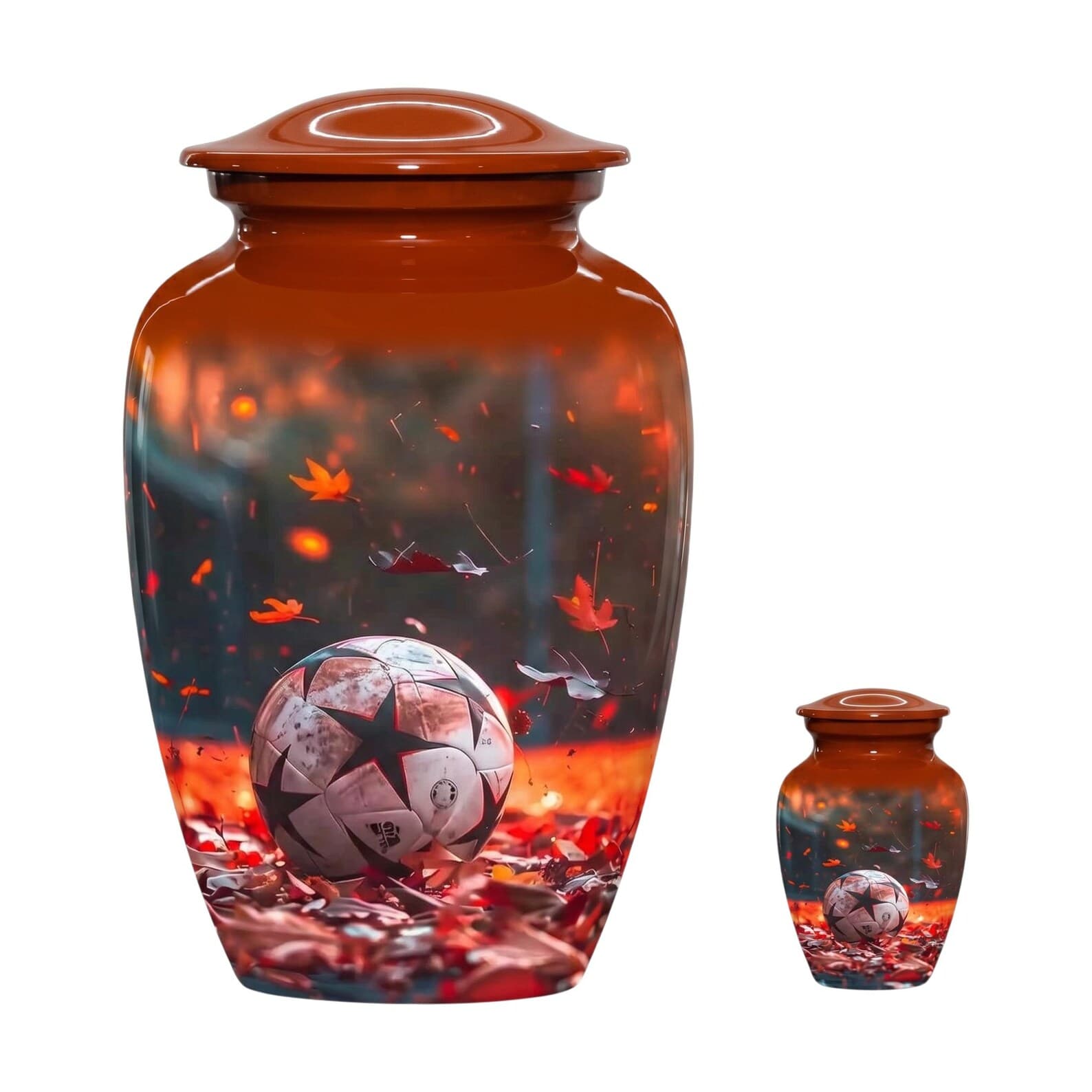 A large and a small cremation urn, both featuring a glossy burnt orange finish. The surface displays a graphic of a soccer ball resting on a bed of fallen autumn leaves, with additional leaves floating in the air against