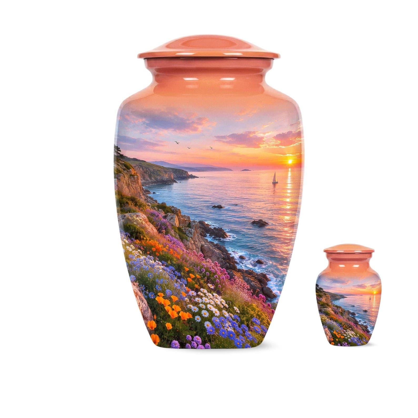 Peach-colored urn with a sunset coastal scene. The urn features a vibrant image of a sunset over the ocean, with colorful flowers and a sailboat. A smaller matching urn is also present.
